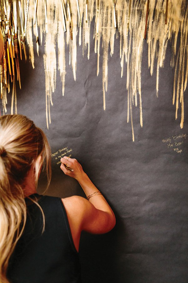 Gold pen guestbook wall