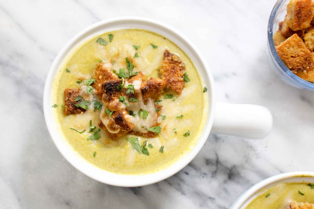 Vegan broccoli cheese soup serve with croutons