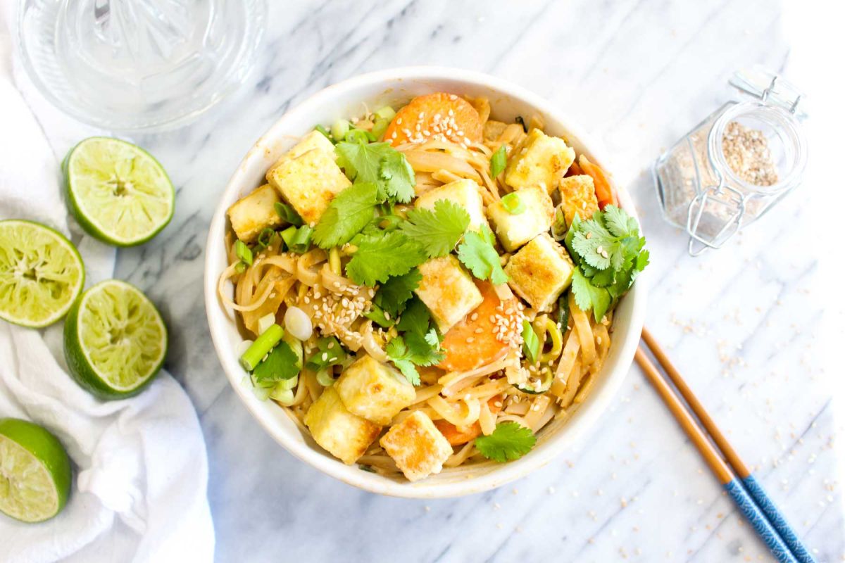 Peanut sauce noodles with crispy tofu top with tofu