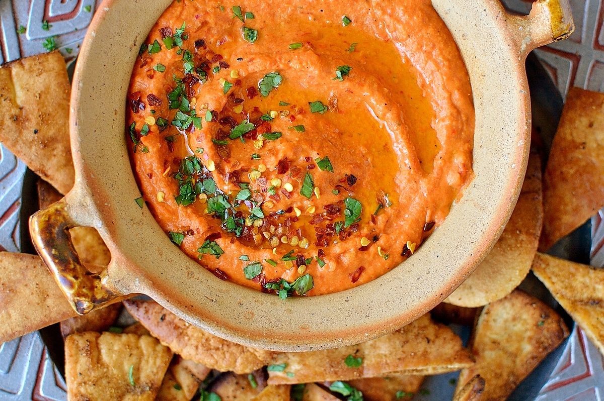 Roasted red pepper and chilli hummus with home-made pitta chips - quick and easy to make and an ideal snack!