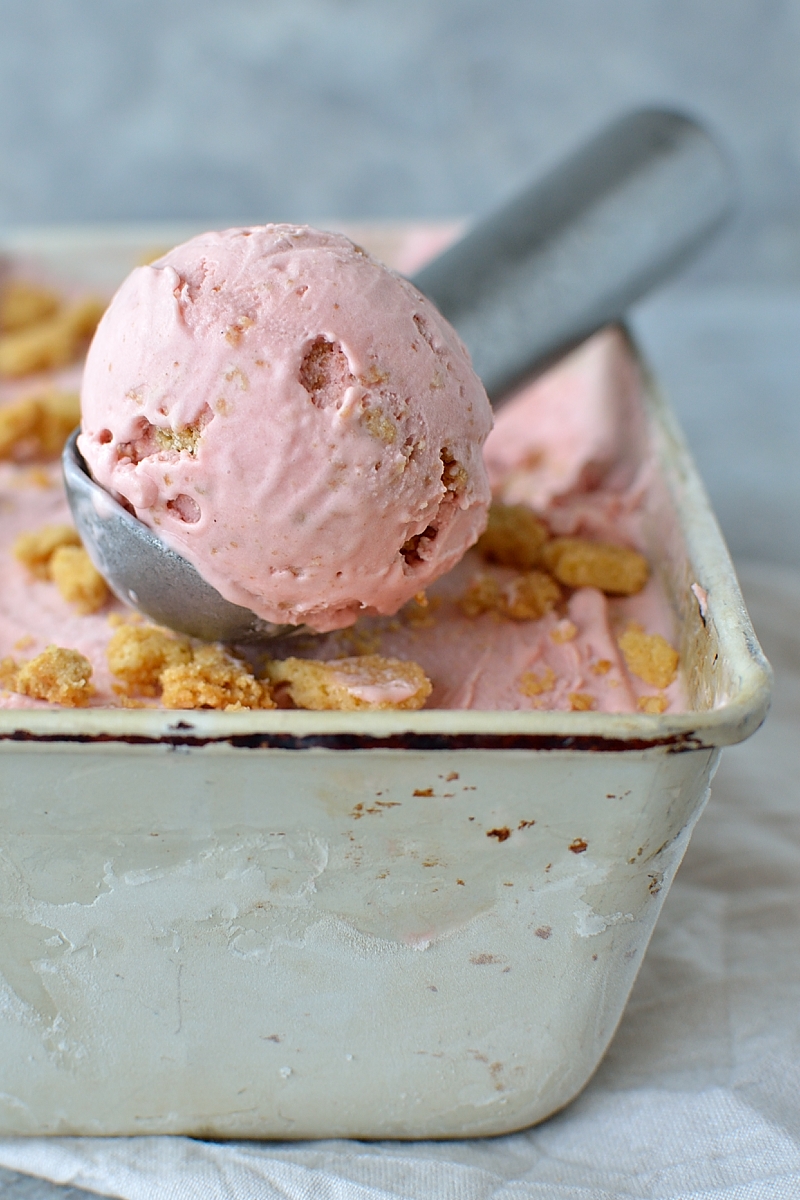 Roasted rhubarb and strawberry crumble ice cream - sweet, creamy, fruity ice cream filled with chunks of crisp, buttery crumble. The perfect ice cream for Spring!