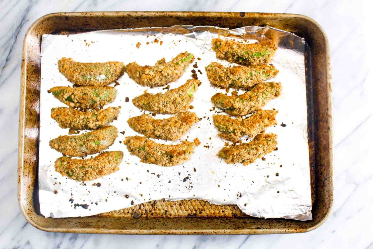 Avocado fries with cilantro lime dipping sauce bake for 10 minutes
