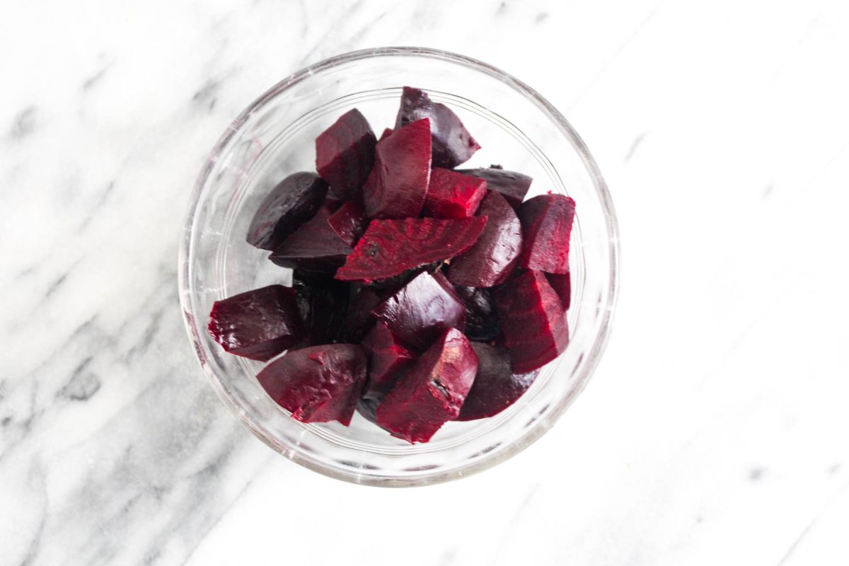 Homemade crudités platter with three dips beet