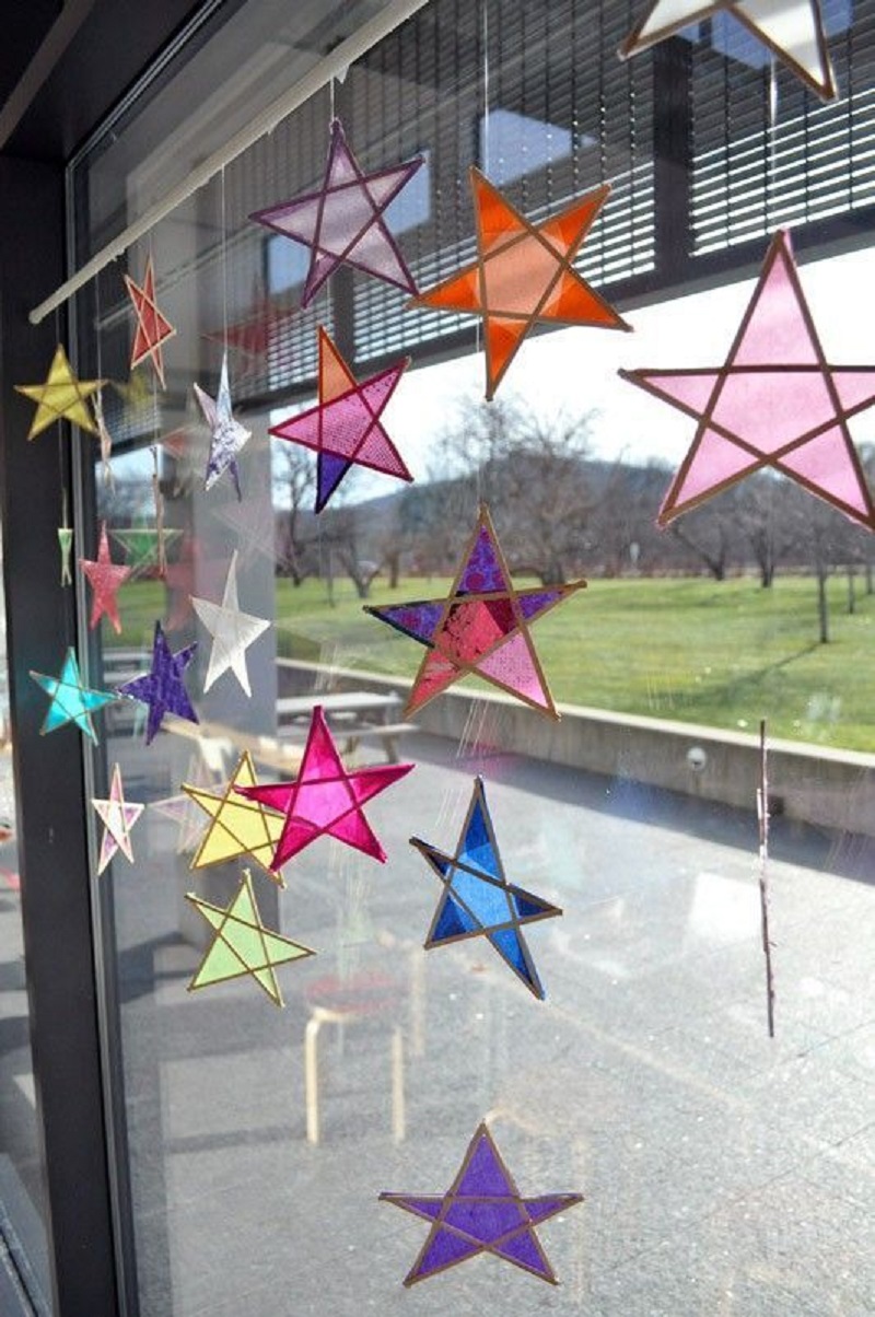 Wood and paper sun catcher stars