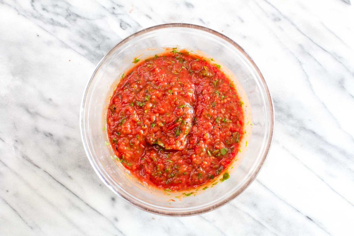 Homemade salsa roja stir