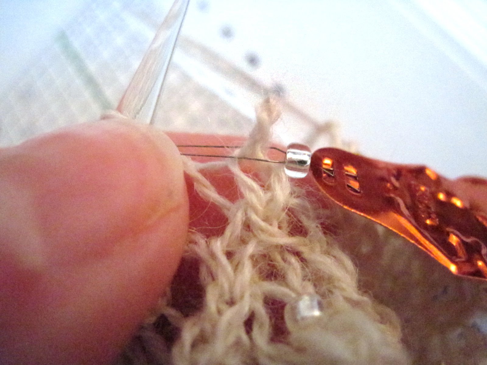 Knitted beading with a needle threader
