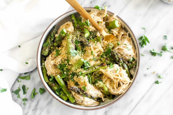Vegan alfredo pasta with grilled asparagus delicious