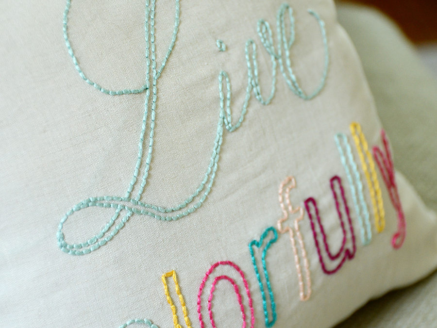 Colorful diy embroidered quote pillow