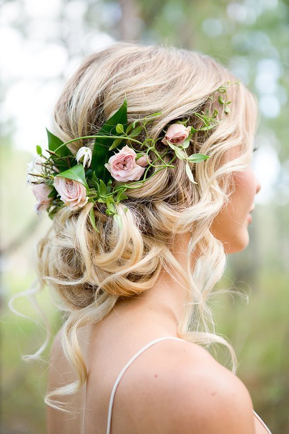 Flowers and a low, loose bun
