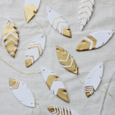 Gold painted clay feathers