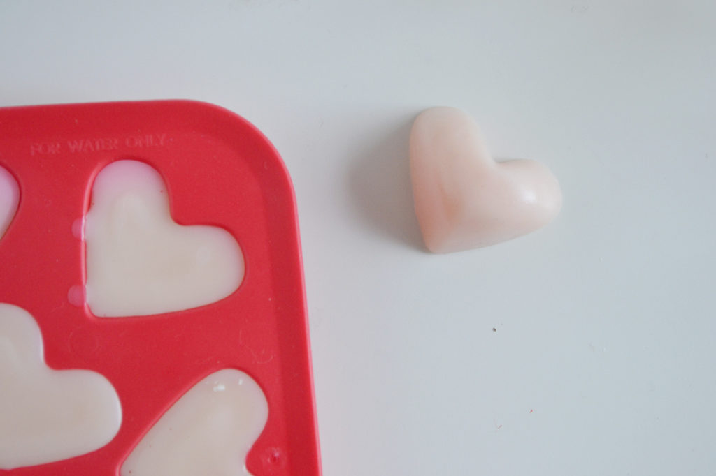 The homemade lotion bars mixture is poured into the mold