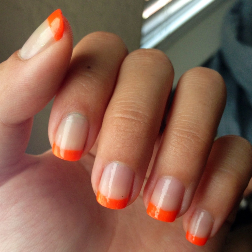 Orange tipped french manicure