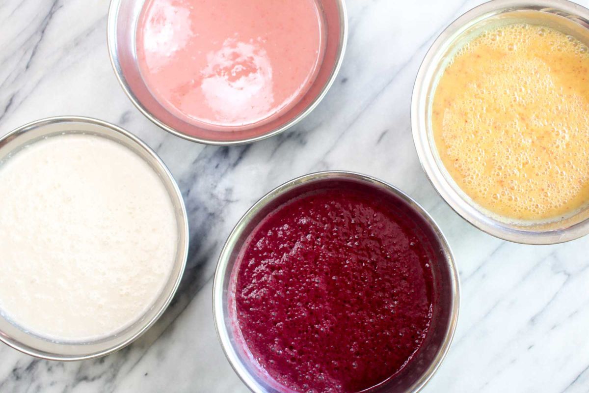 Rainbow chia seed pudding combine maple syrup to a blender