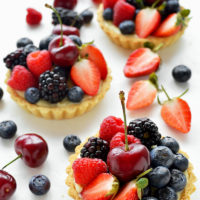 Coconut and berry fruit tarts - a perfect Summer dessert with a tropical twist.