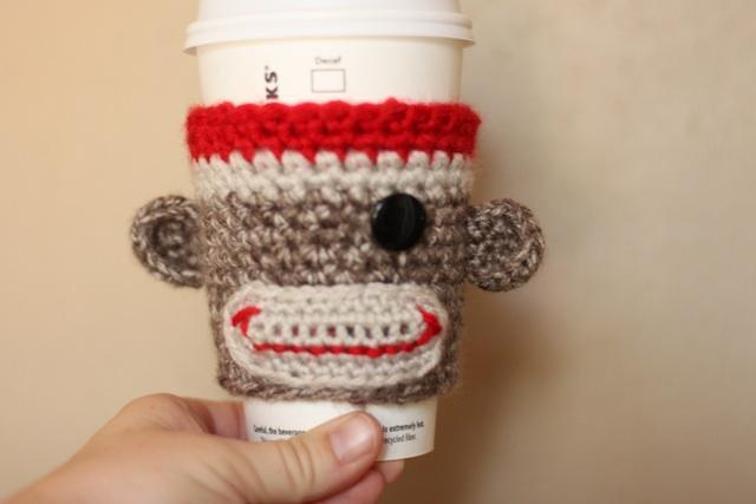 Crocheted sock monkey cozy