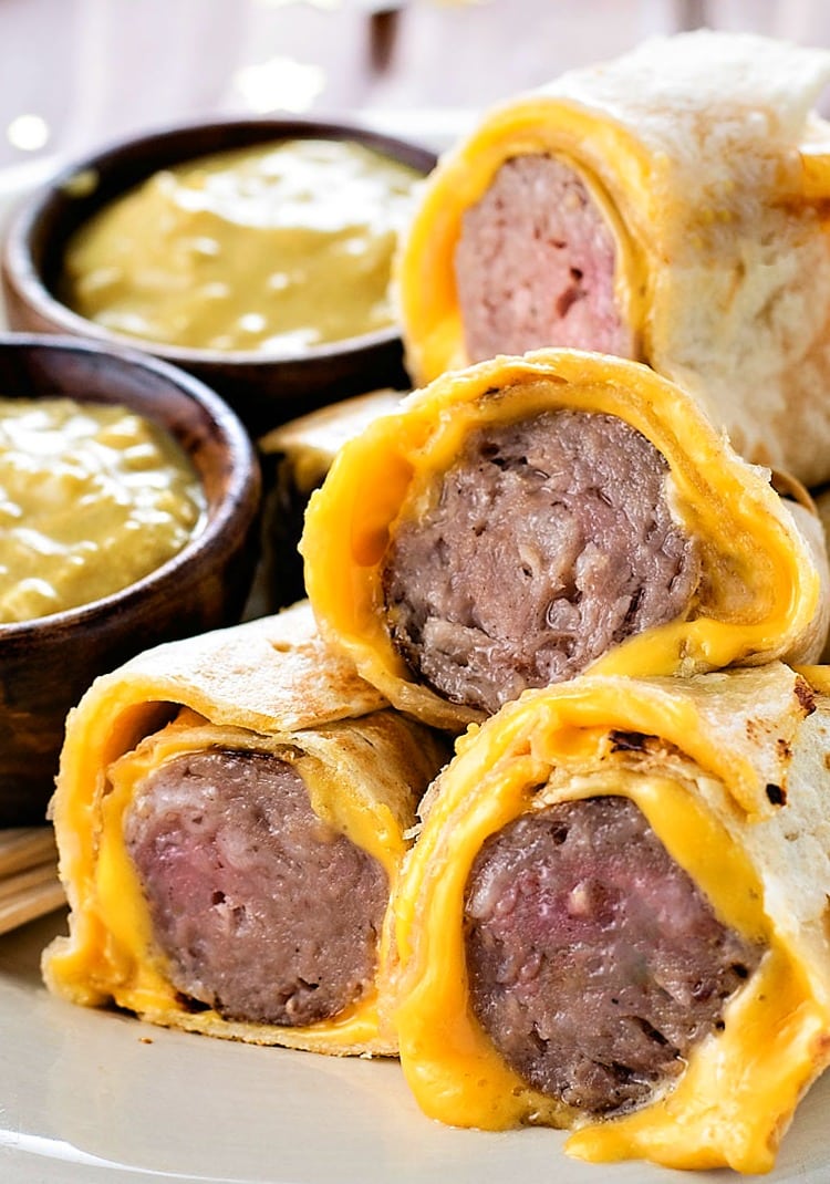 Tortilla wrapped bratwurst with beer mustard 1 1