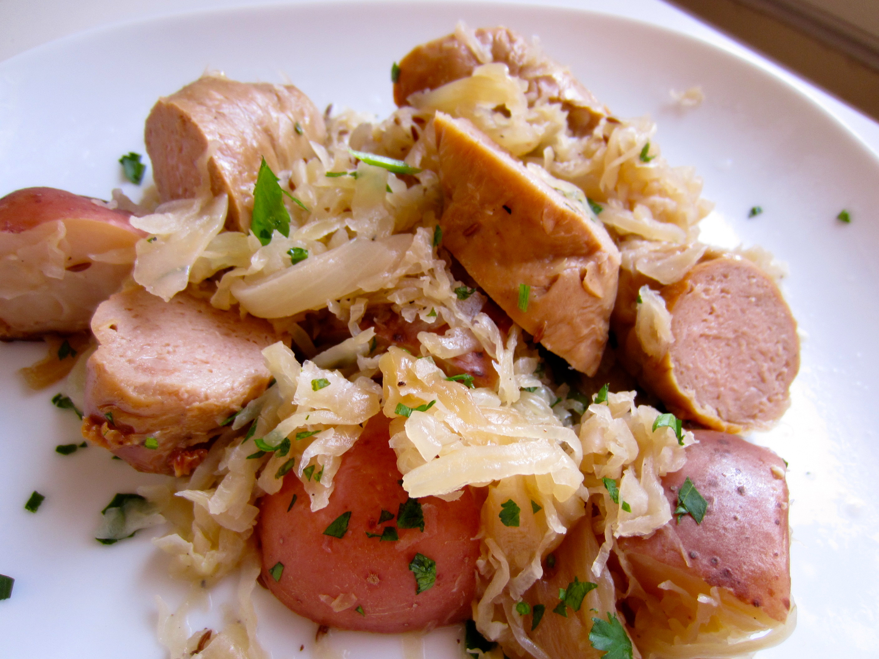 Crock pot bratwurst with potatoes and sauerkraut