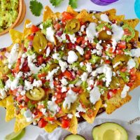 Loaded veggie nachos - the best way to eat a bag of chips for dinner!
