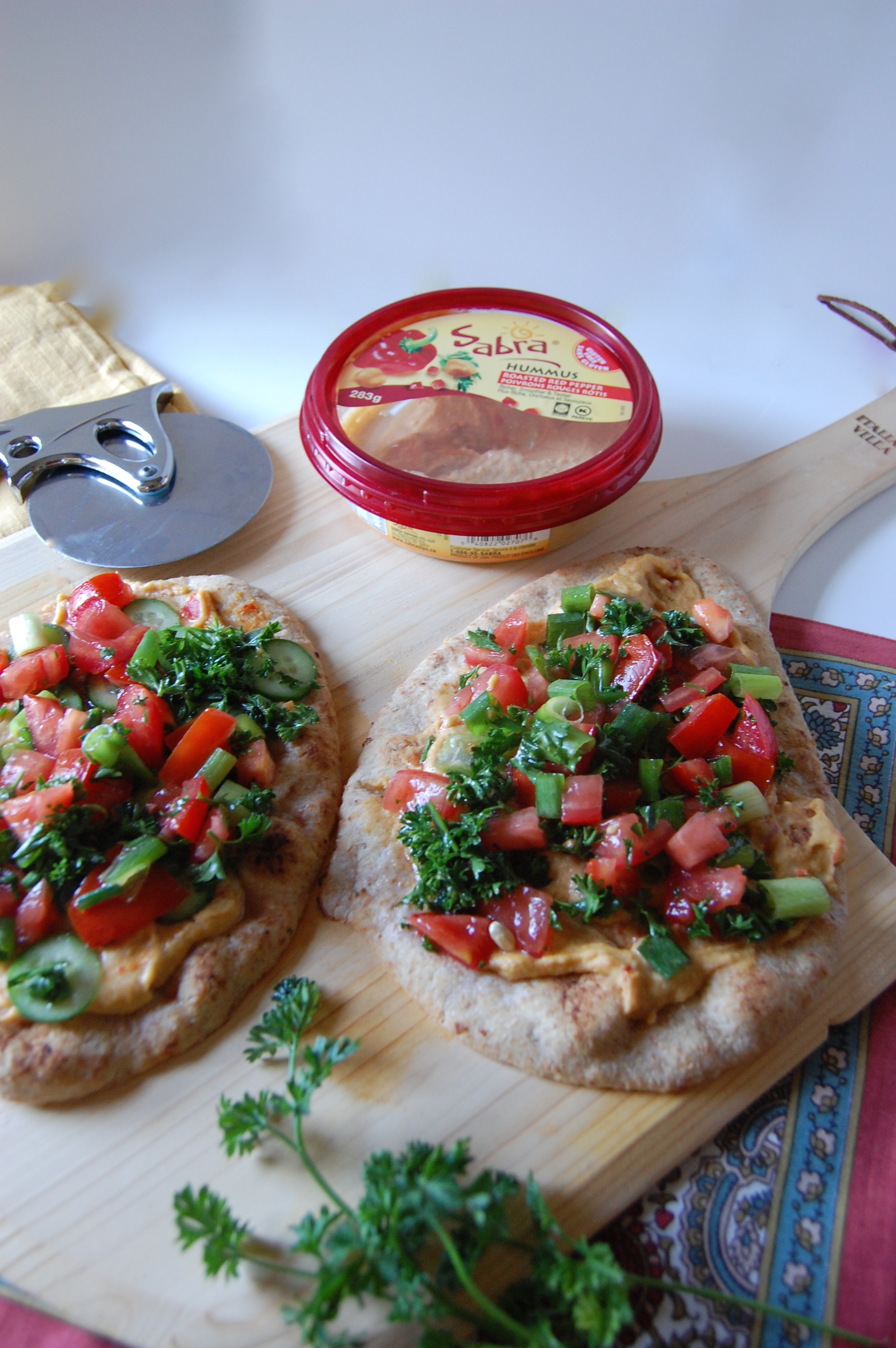 Mediterraneaon hummus naan bread pizza