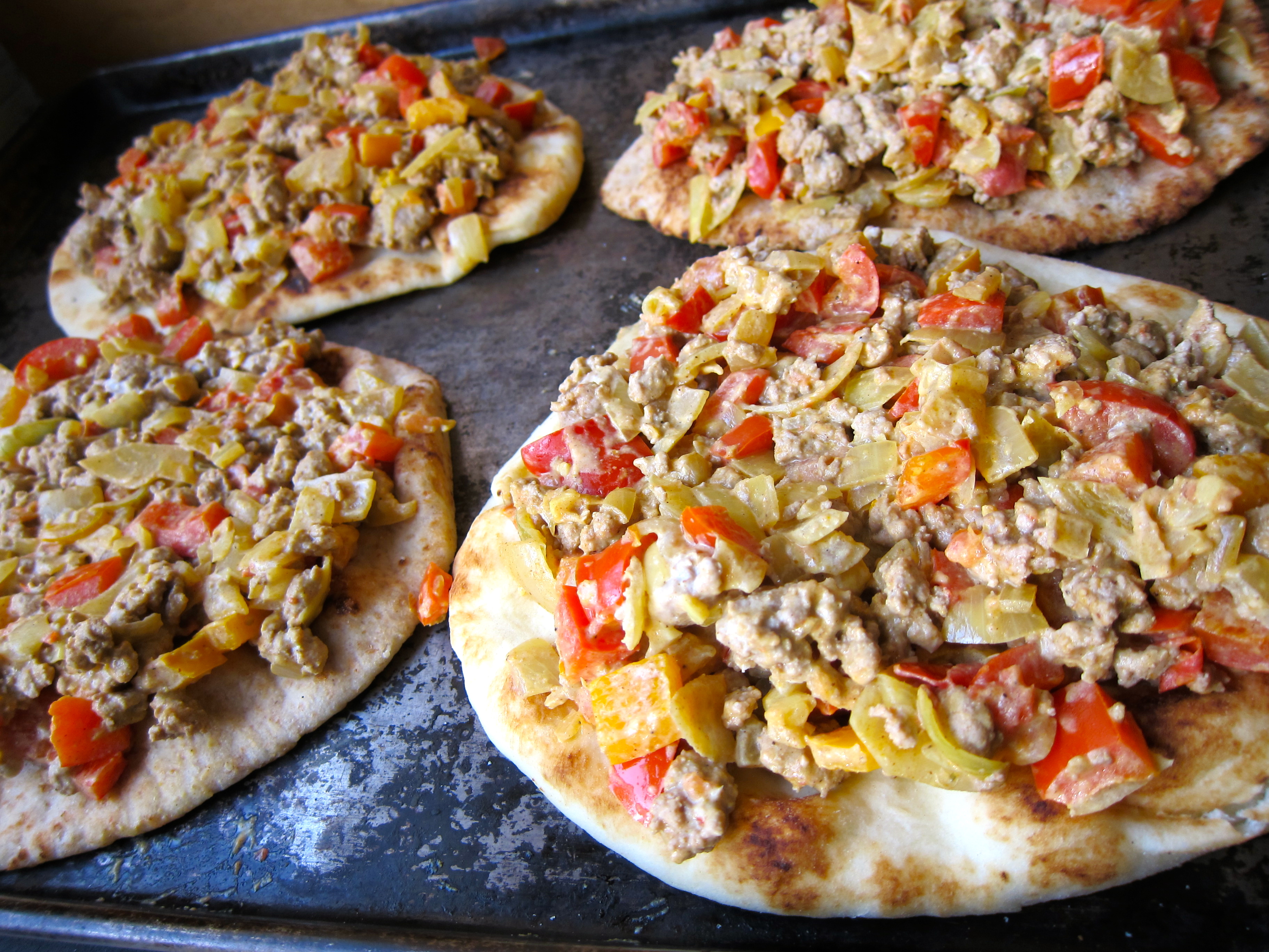 Turkey curry naan pizza