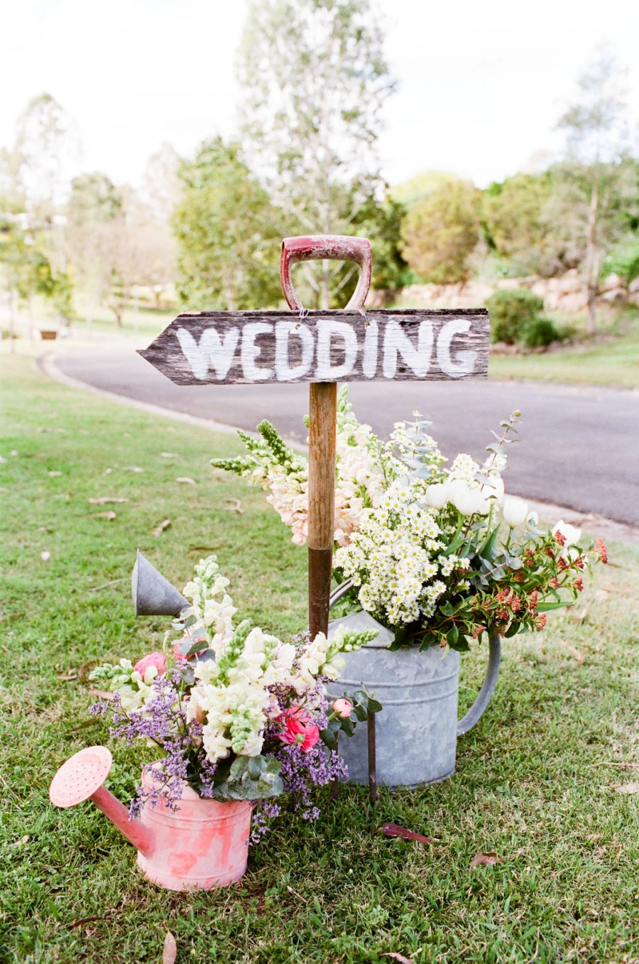 Wooden handled shovel wedding decor