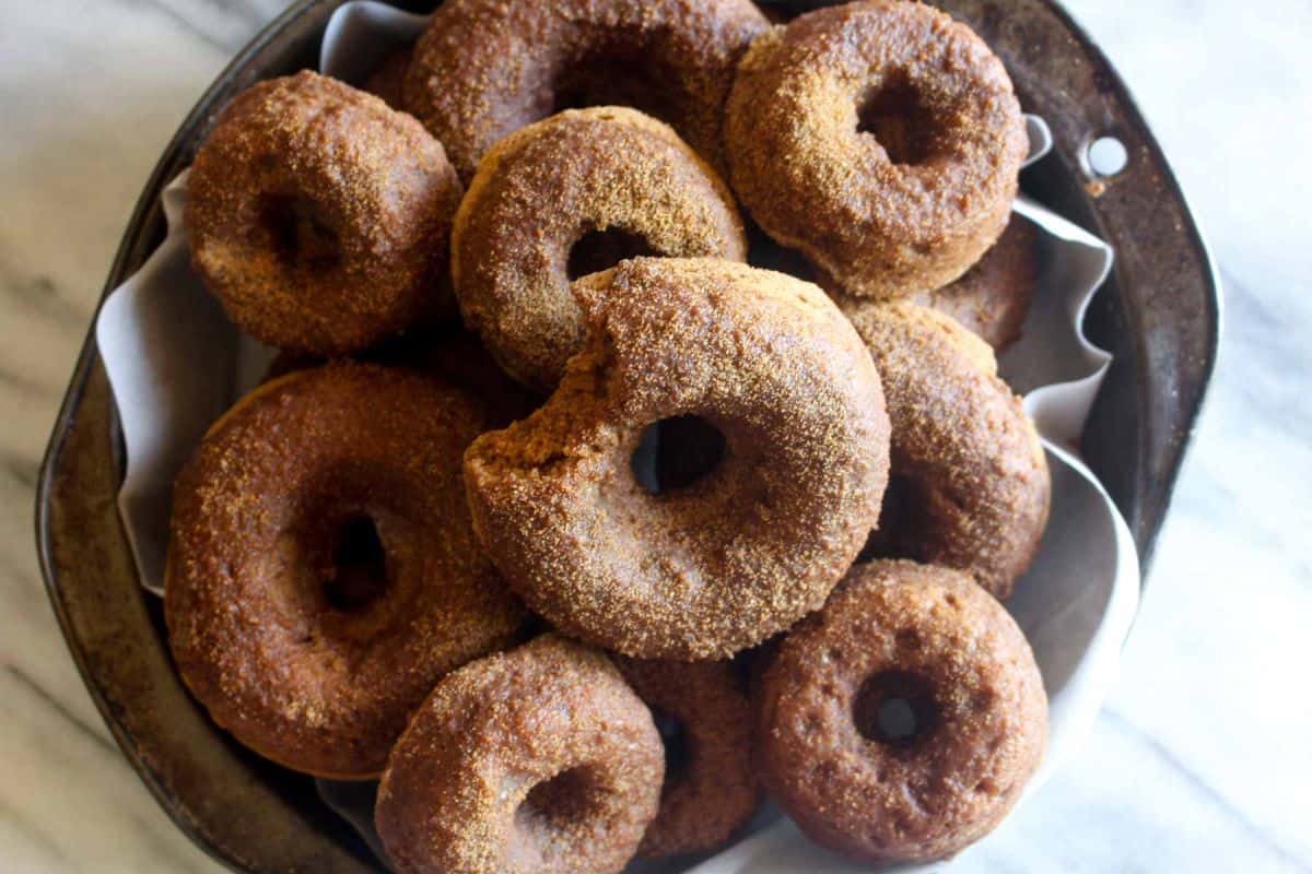 Baked pumpkin donuts with chai spice glaze top