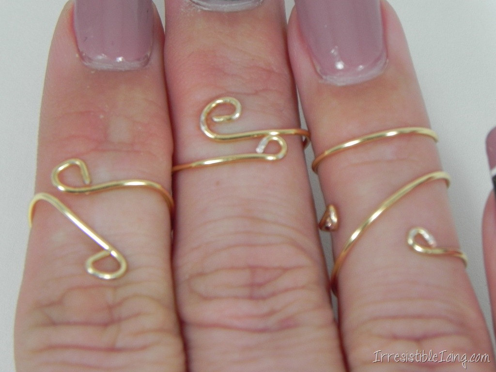 Delicate gold spiral rings