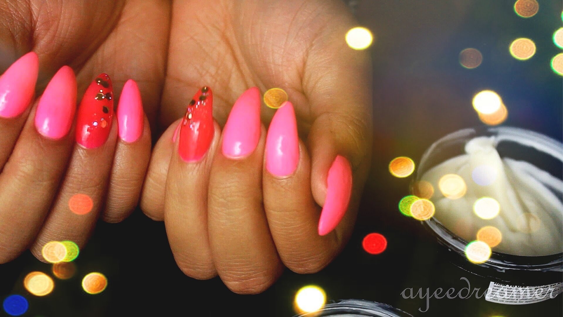 Pink with gemstone stiletto nails
