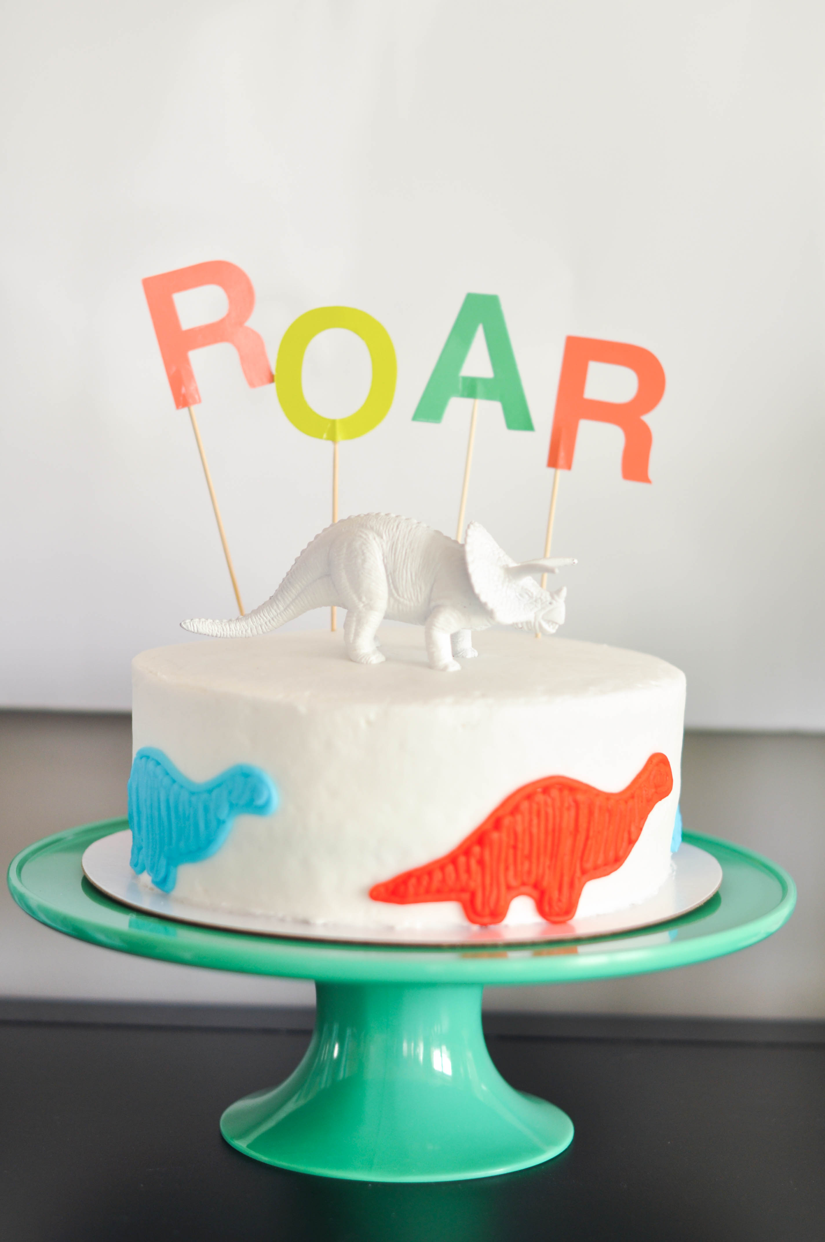 Roaring dinosaur birthday cake