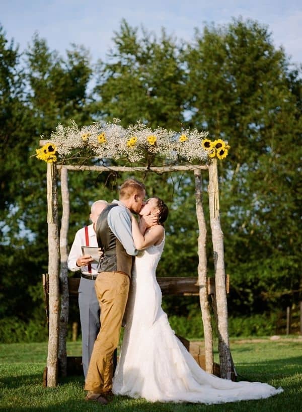 Diy sunflowers and baby's breath wedding arch