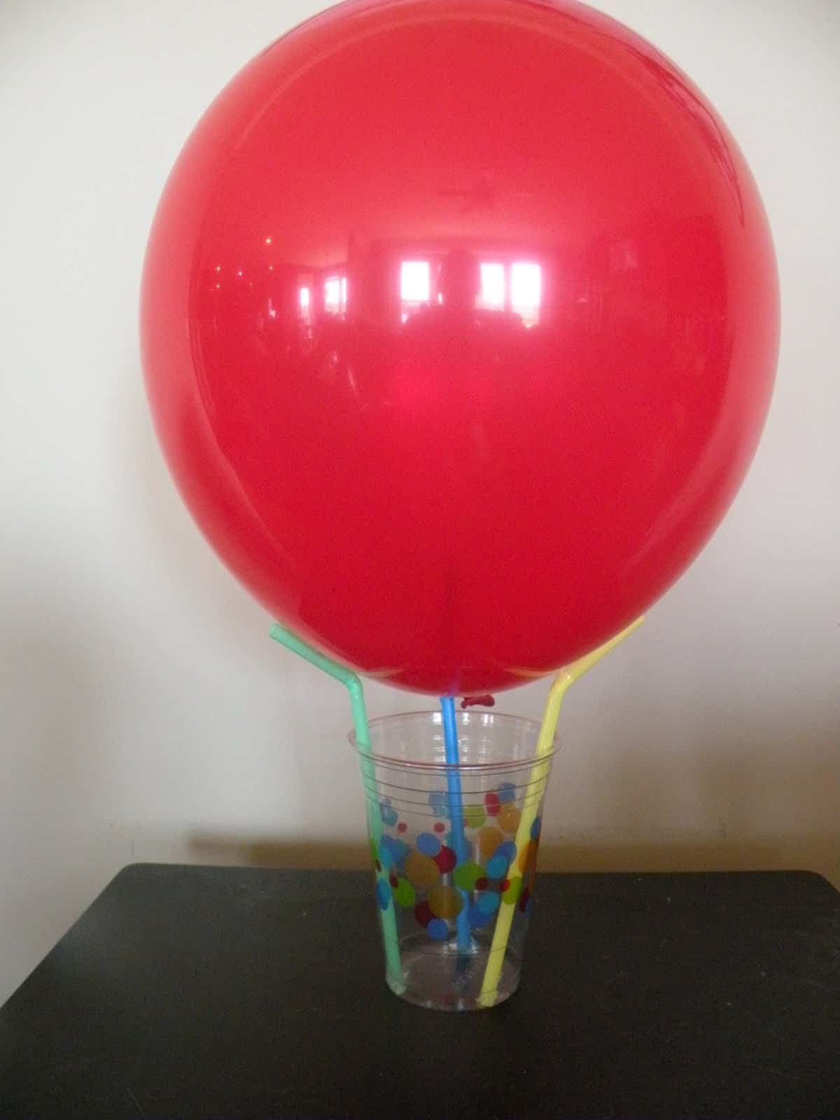 Balloon, cup, and straw hot air balloon