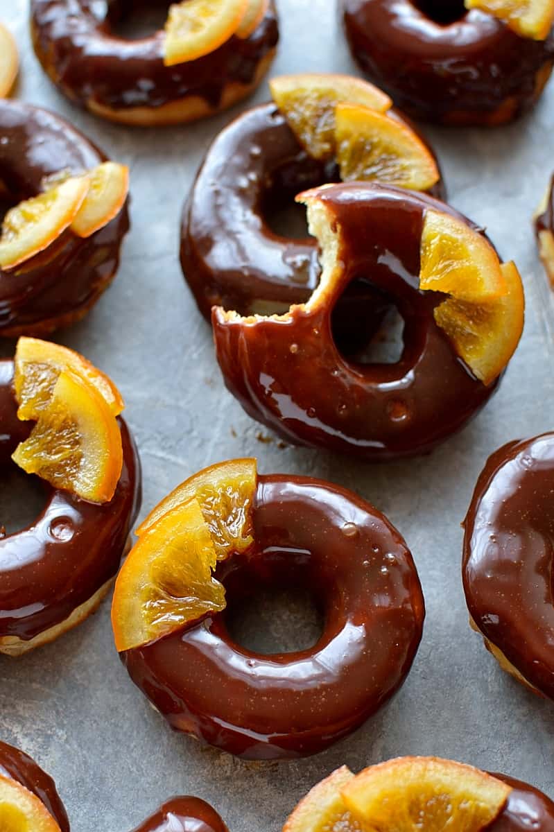 Chocolate orange doughnuts – soft, light-as-air orange infused yeast doughnuts with chocolate orange glaze and candied oranges – pure bliss!