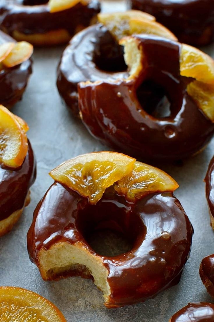 Chocolate orange doughnuts – soft, light-as-air orange infused yeast doughnuts with chocolate orange glaze and candied oranges – pure bliss!