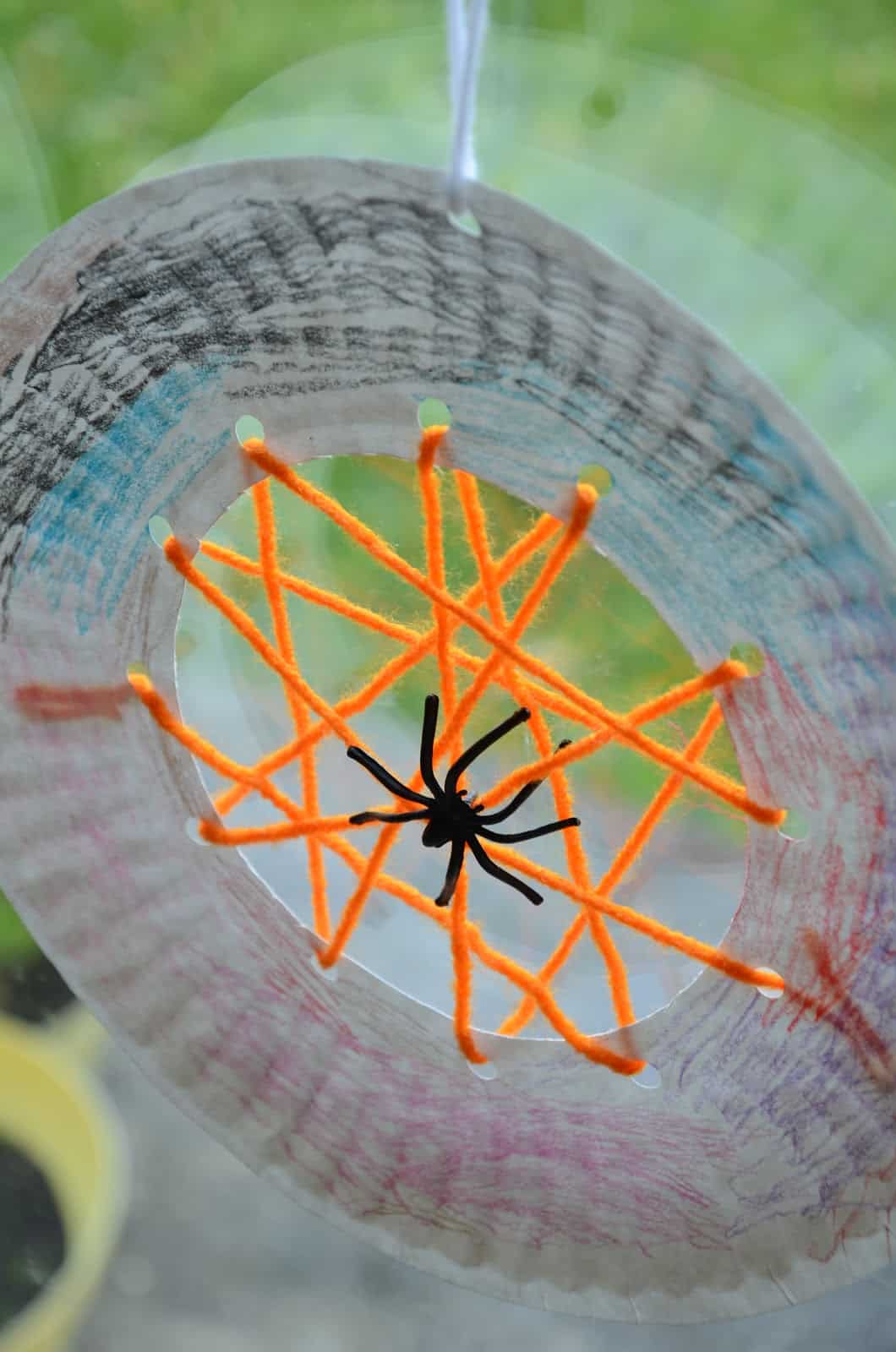 Paper plate and yarn cobweb