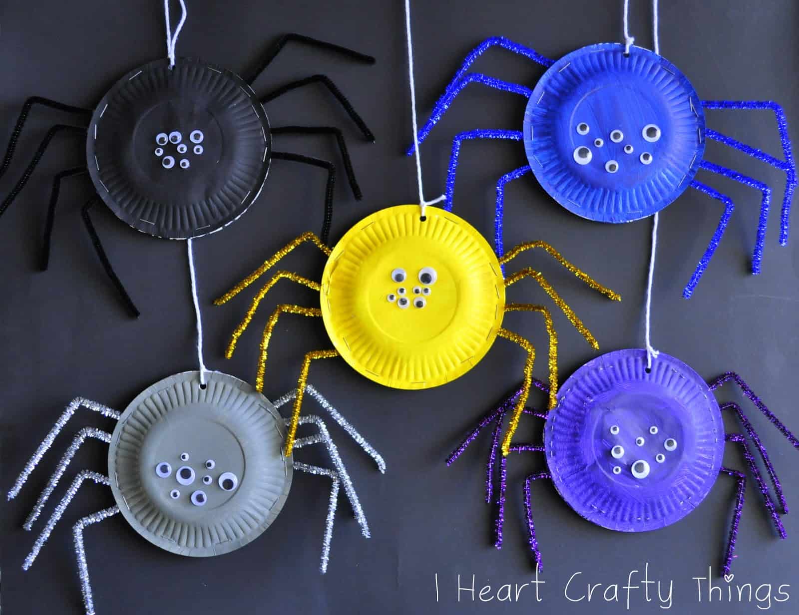 Paper plate, pipe cleaner, and googly eye spider