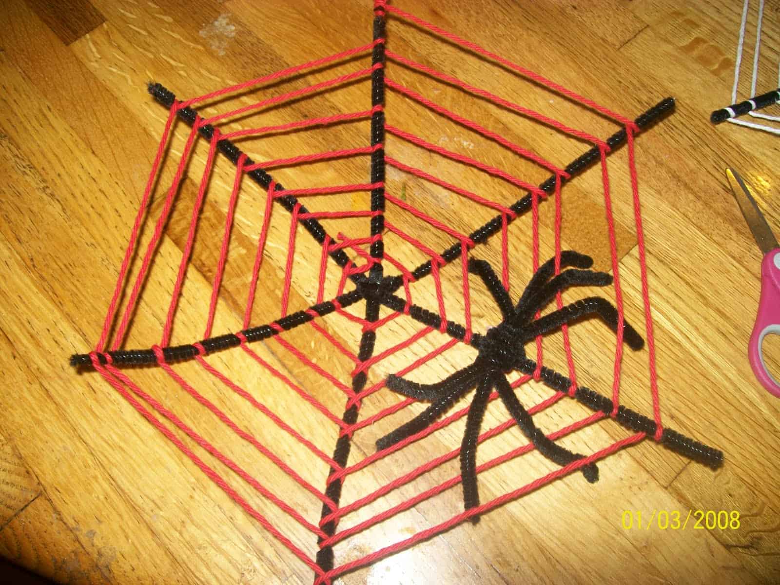 Yarn woven pipe cleaner web