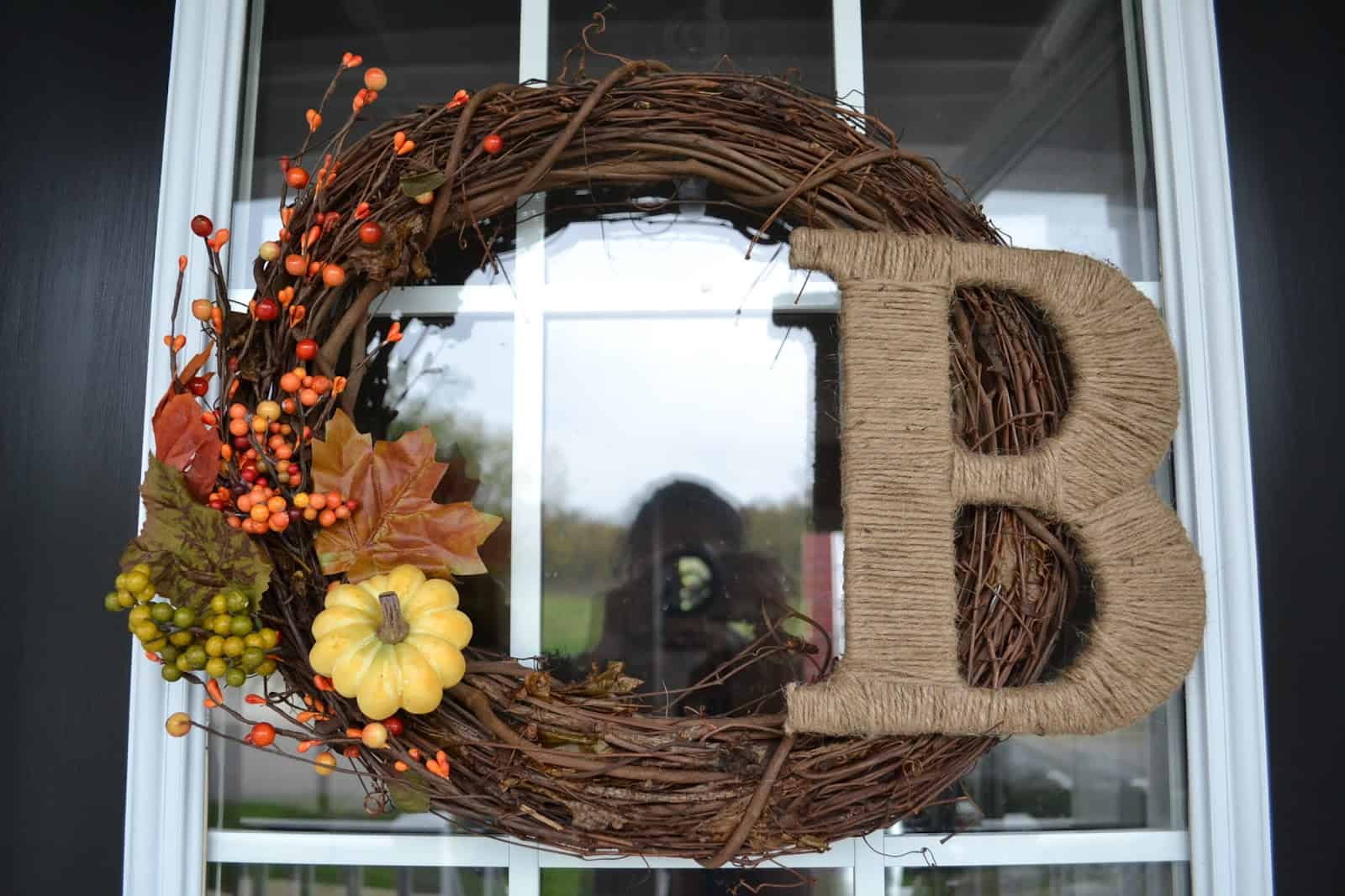 Berries and a burlap string wrapped monogram