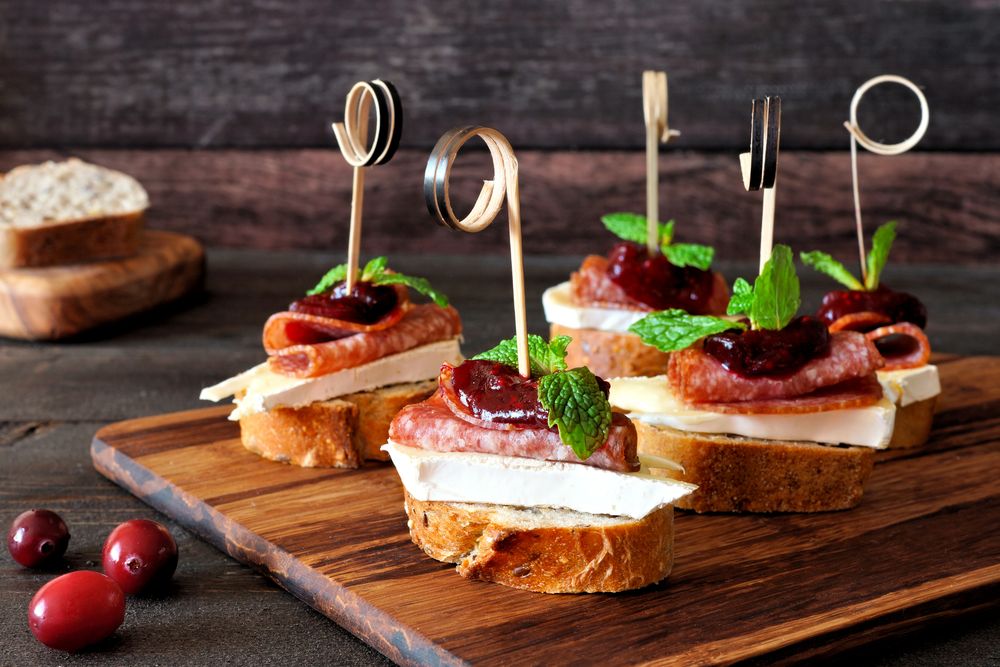 Crostini skewers with salami, brie & cranberry sauce holiday appetizers