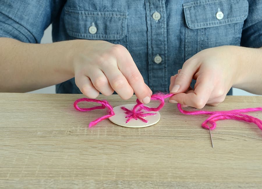 Stitched wooden ornament 7