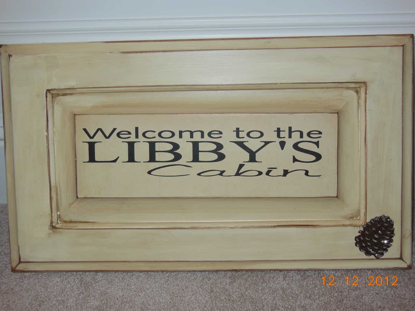 Upcycled cabinet door welcome sign