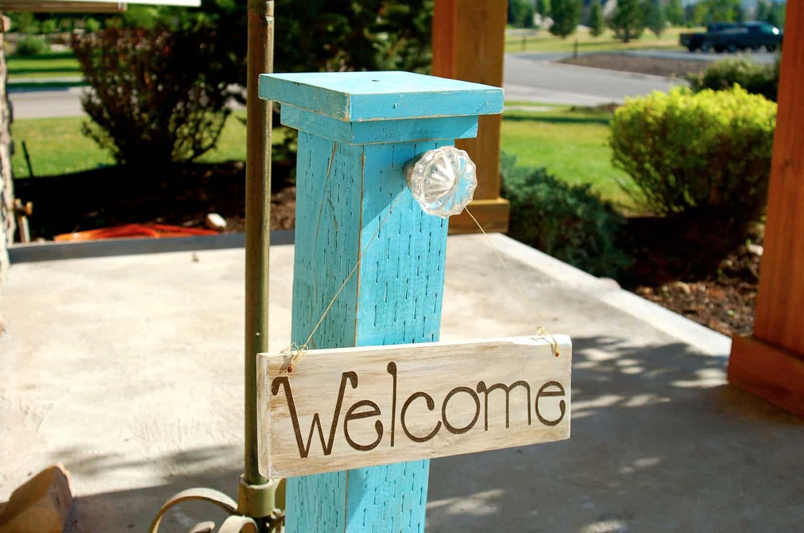 Wooden post and drawer knob sign