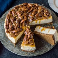 Pecan pie cheesecake – two amazing desserts rolled into one; the perfect way to shake up your Thanksgiving dinner!