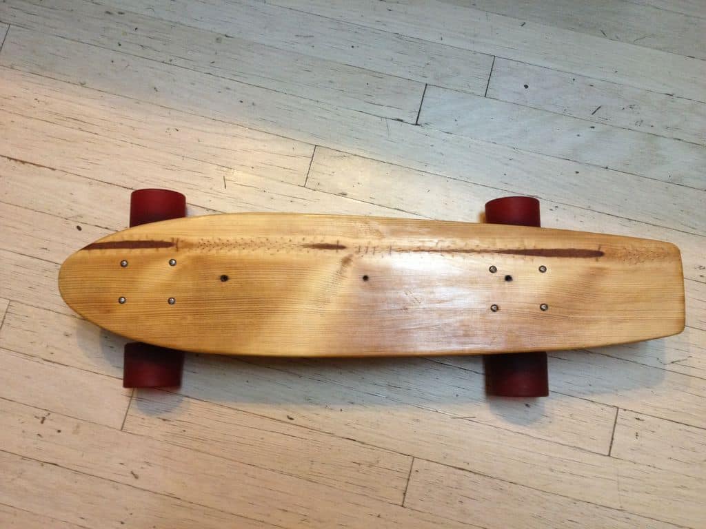 Homemade reclaimed wood skateboard