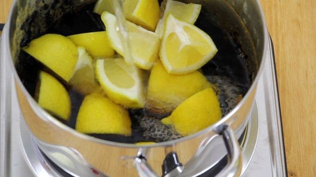 Boil lemons in a pot