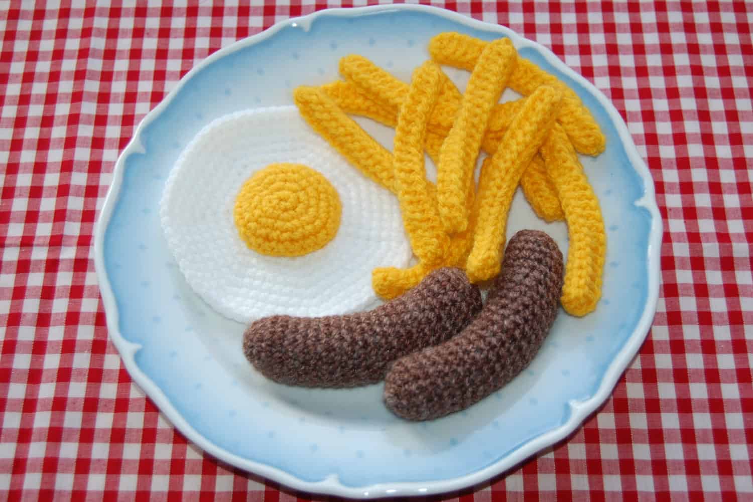 Crocheted sausage breakfast
