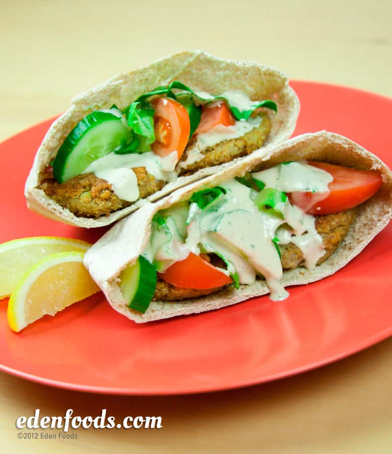 Falafel pita with tahini, cucumber, and tomato