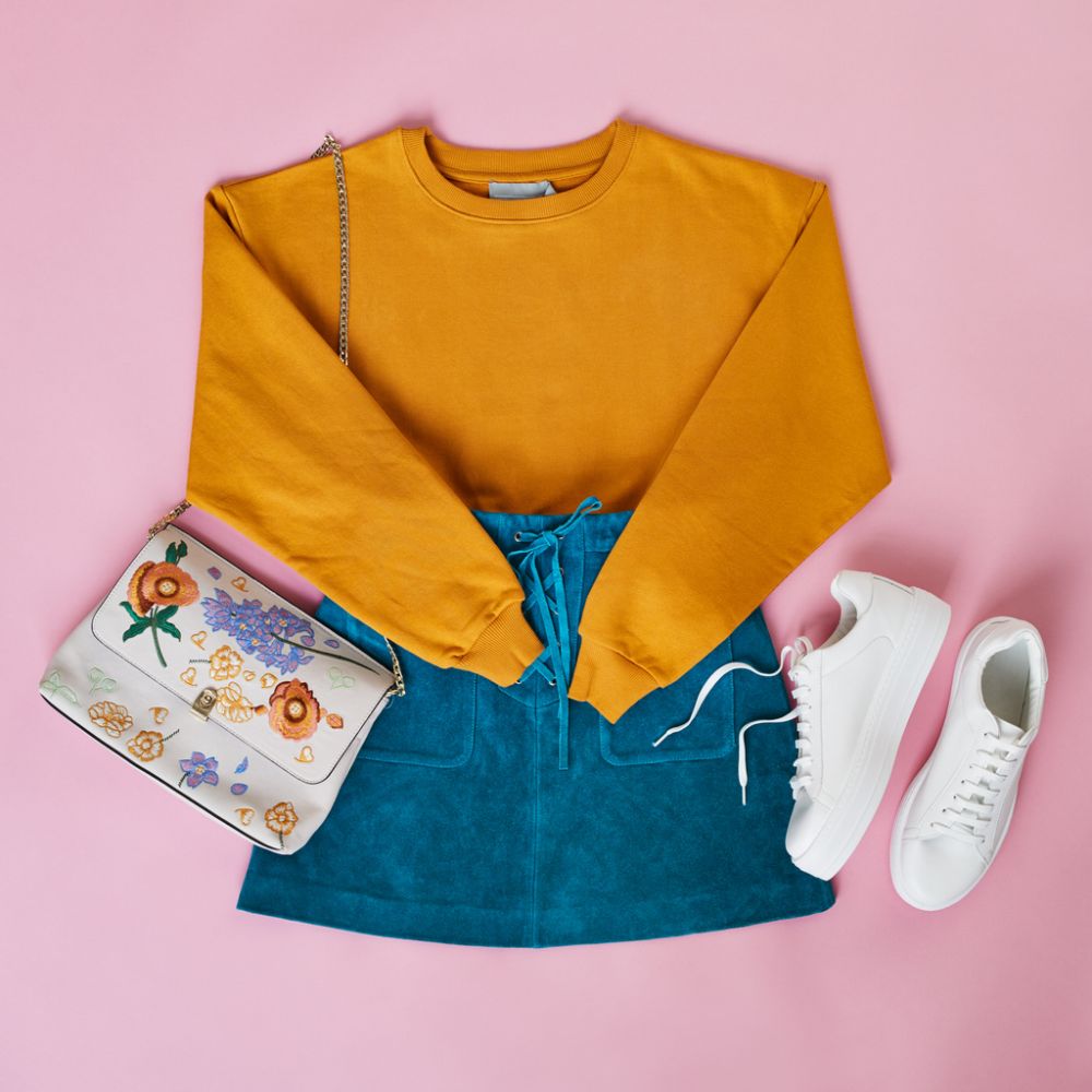 Brightly colored blouses with denim skirts and sneakers - Spring Outfits for Women