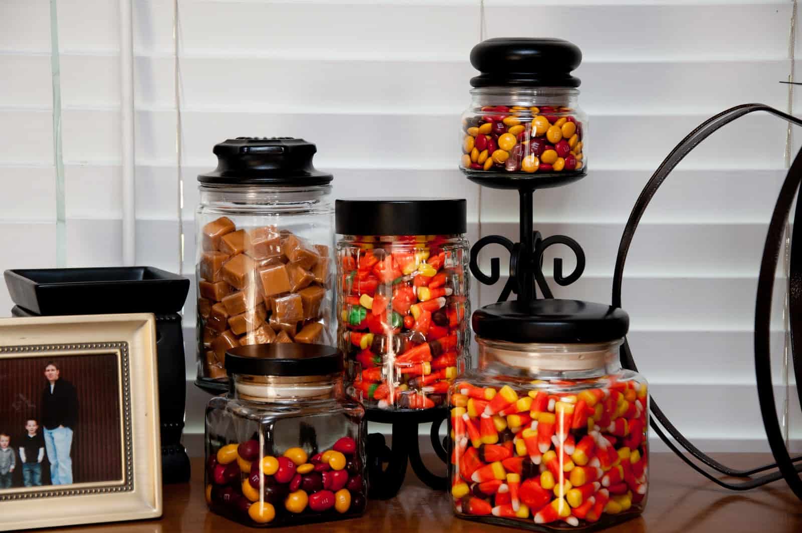 Halloween candy in old candle jars