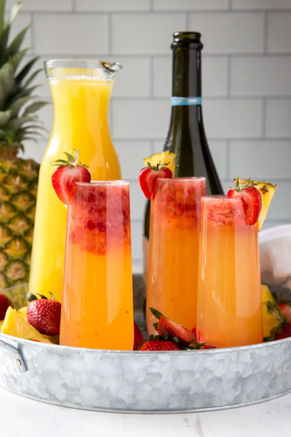 Pineapple Strawberry Mimosa - Spring Cocktail Ideas