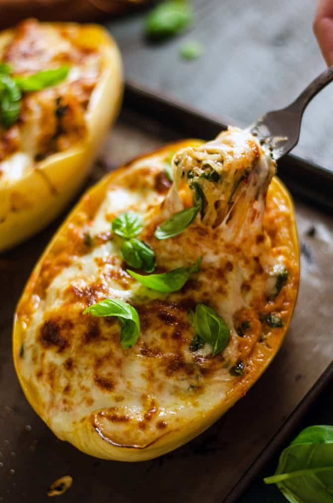 Cheesy tuscan spaghetti squash with roasted garlic and spinach